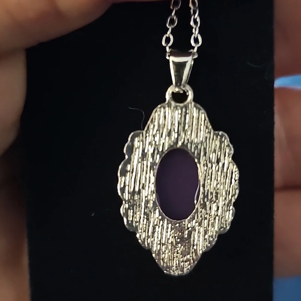 Elegant Silver Necklace with Purple Pendant